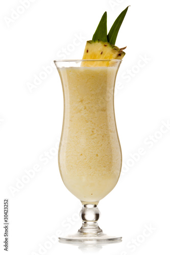 Pina colada drink cocktail glass isolated on white background
