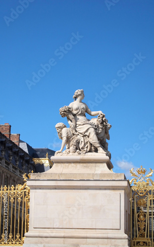 Statue at Versailles Chateau entrance in France