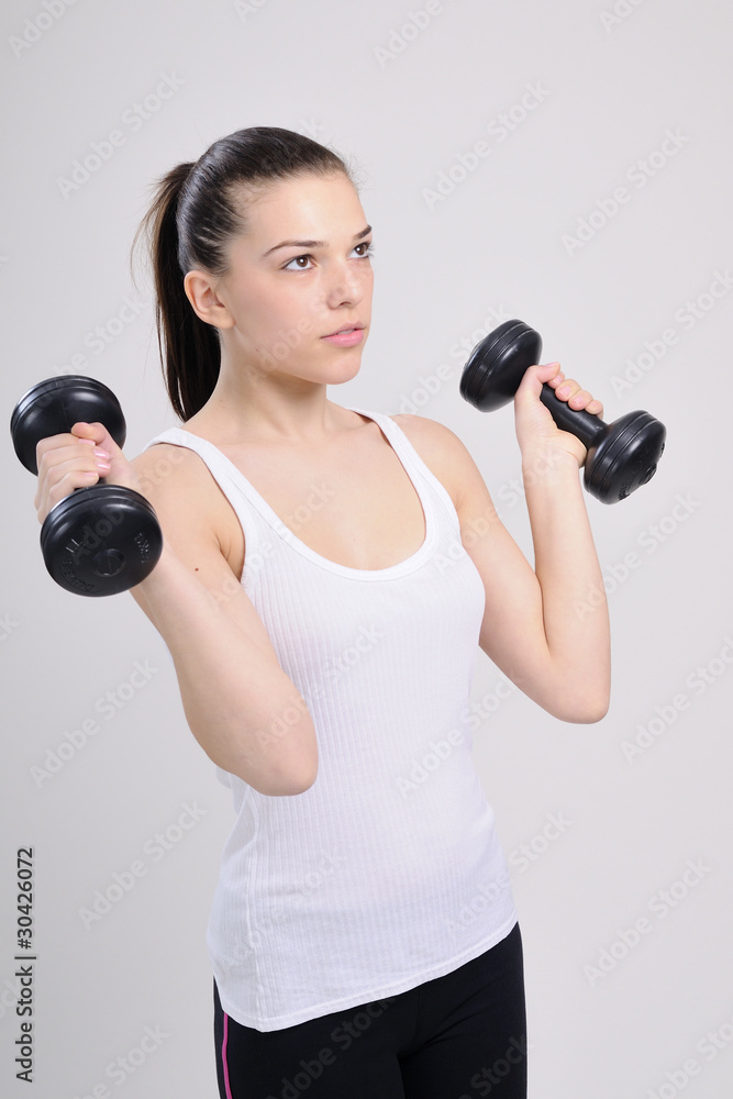 girl working with dumbbells girl working with dumbbells