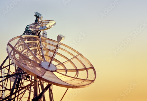telecommunications tower at the sunset photo