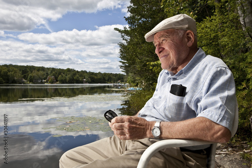 Senior man enjoying a day at the lake