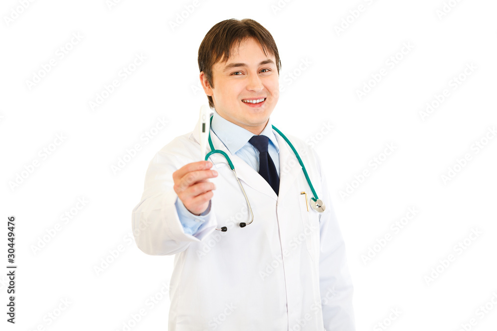 Smiling doctor holding medical thermometer in hand Smiling doctor holding medical thermometer in hand