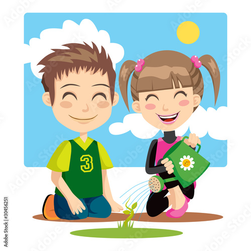 Children irrigating a plant with a green watering can