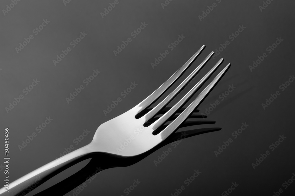 Abstract image for kitchen. Fork with reflection. Abstract image for kitchen. Fork with reflection.