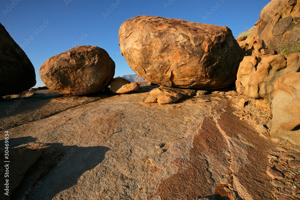 Large granite boulders, Brandberg mountain, Namibia Large granite boulders, Brandberg mountain, Namibia