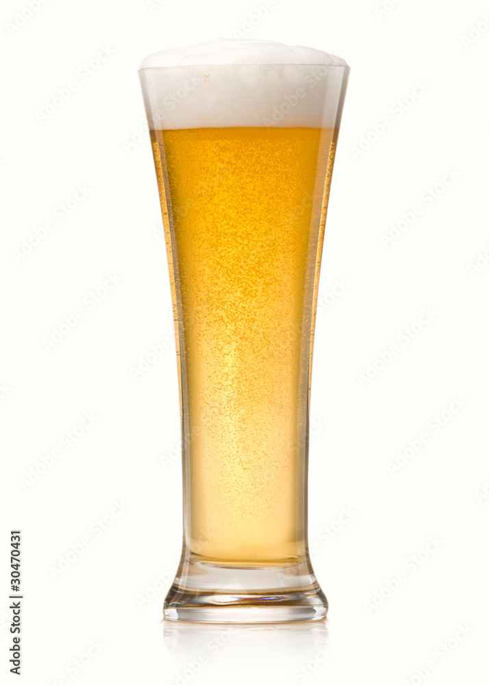 Beer into glass isolated on white Beer into glass isolated on white
