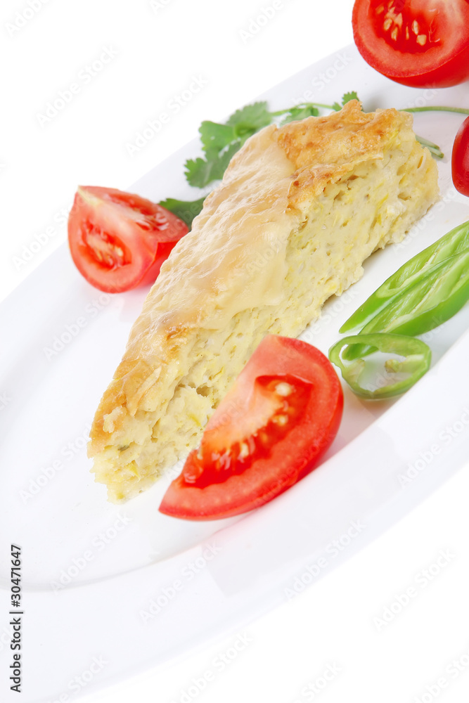 vegetable casserole piece over white plate vegetable casserole piece over white plate