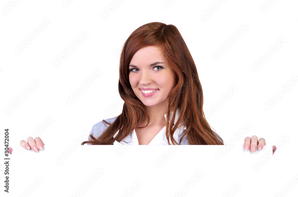 Beautiful young woman holding an empty billboard Beautiful young woman holding an empty billboard