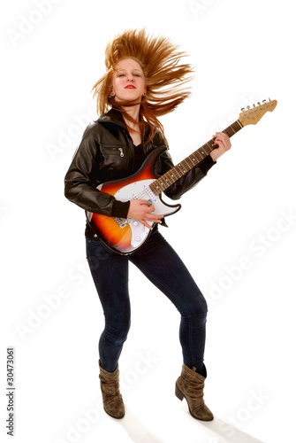 Rocker Chick with Electric Guitar Tossing her Hair