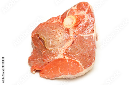 raw piece of beef isolated on a white background