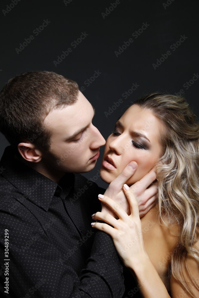 handsome man is about to kiss a beautiful woman handsome man is about to kiss a beautiful woman