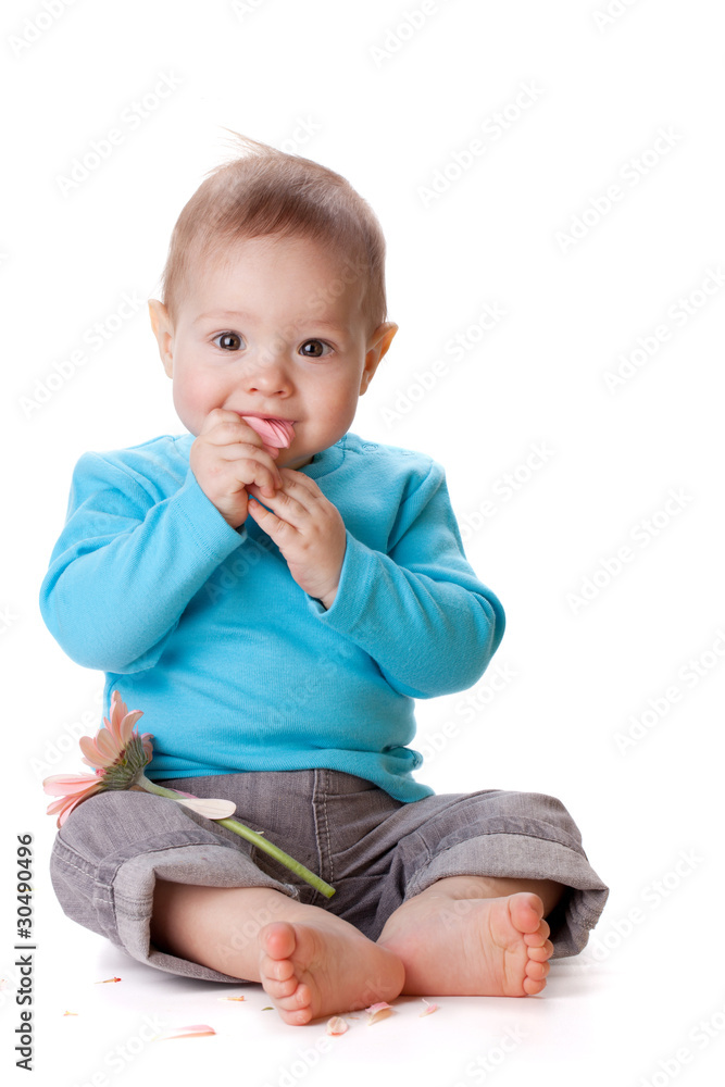 Small baby eating petals