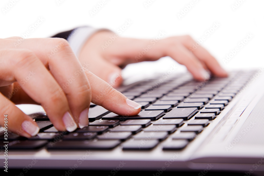 Close-up of secretary’s hand touching computer keys during work Close-up of secretary’s hand touching computer keys during work