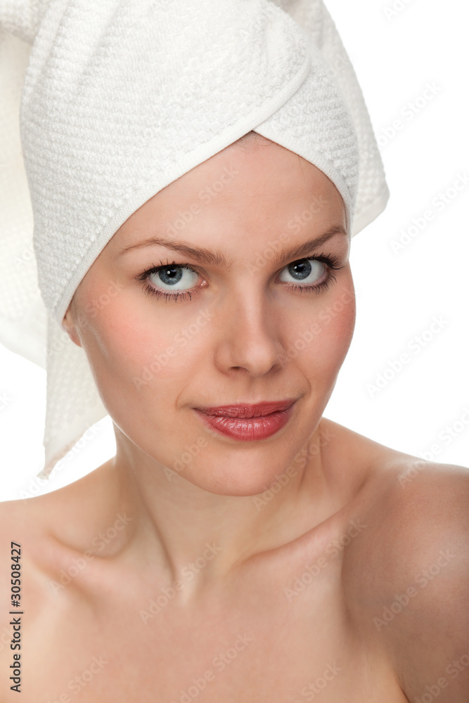 Woman with a towel wrapped around her Woman with a towel wrapped around her
