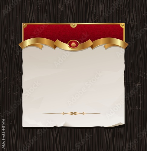 Vintage golden frame with paper banner on wood backgraund