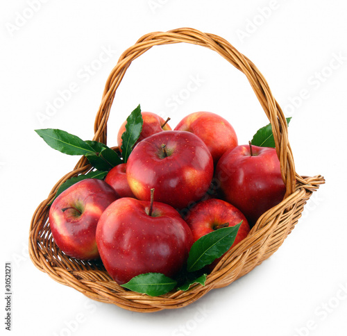 red apples in basket on white background