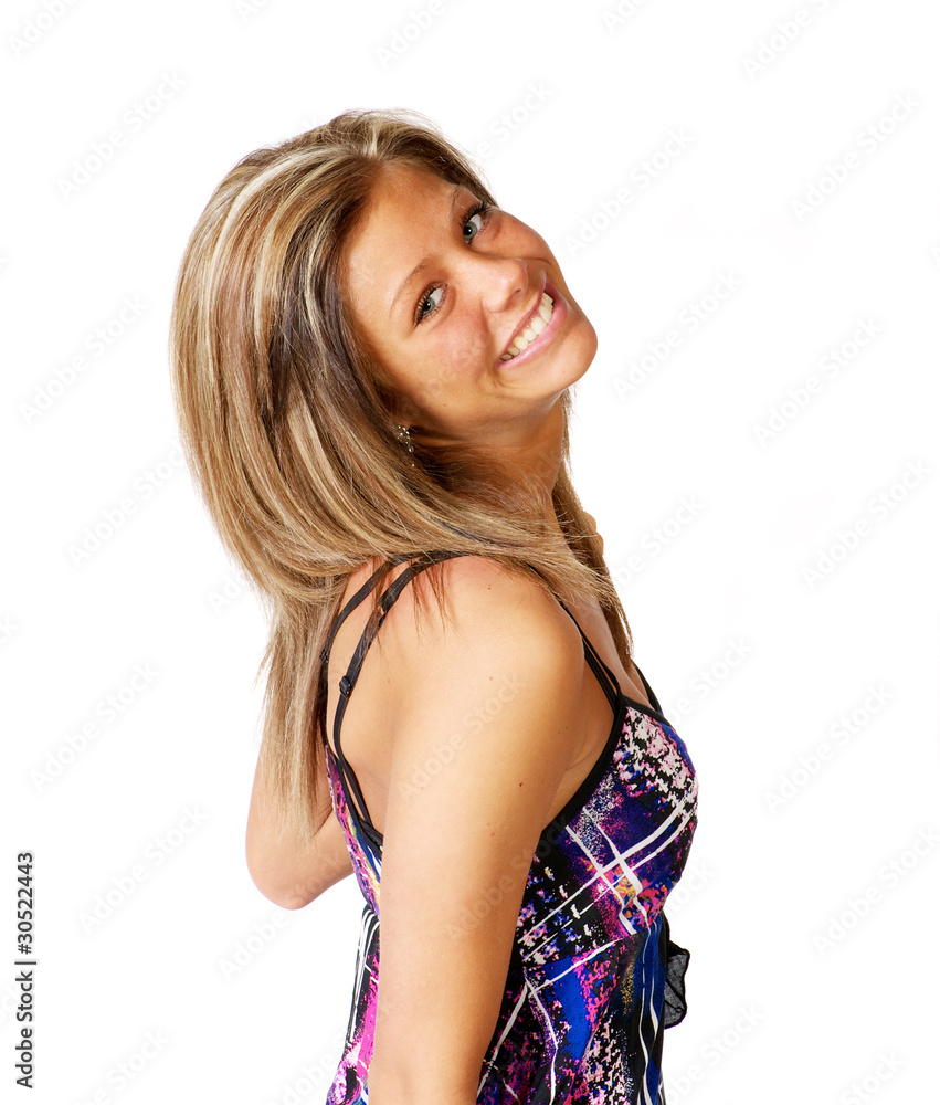 Blond female model in studio over white background.