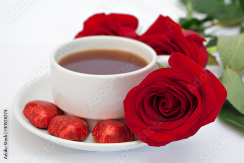 cup of tea and a bouquet of roses