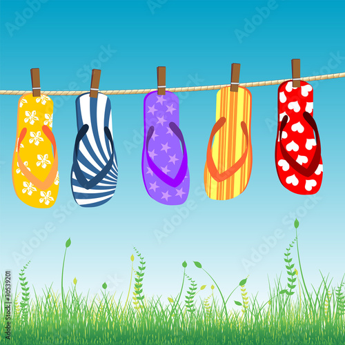 Beach sandals collection hanged on a rope
