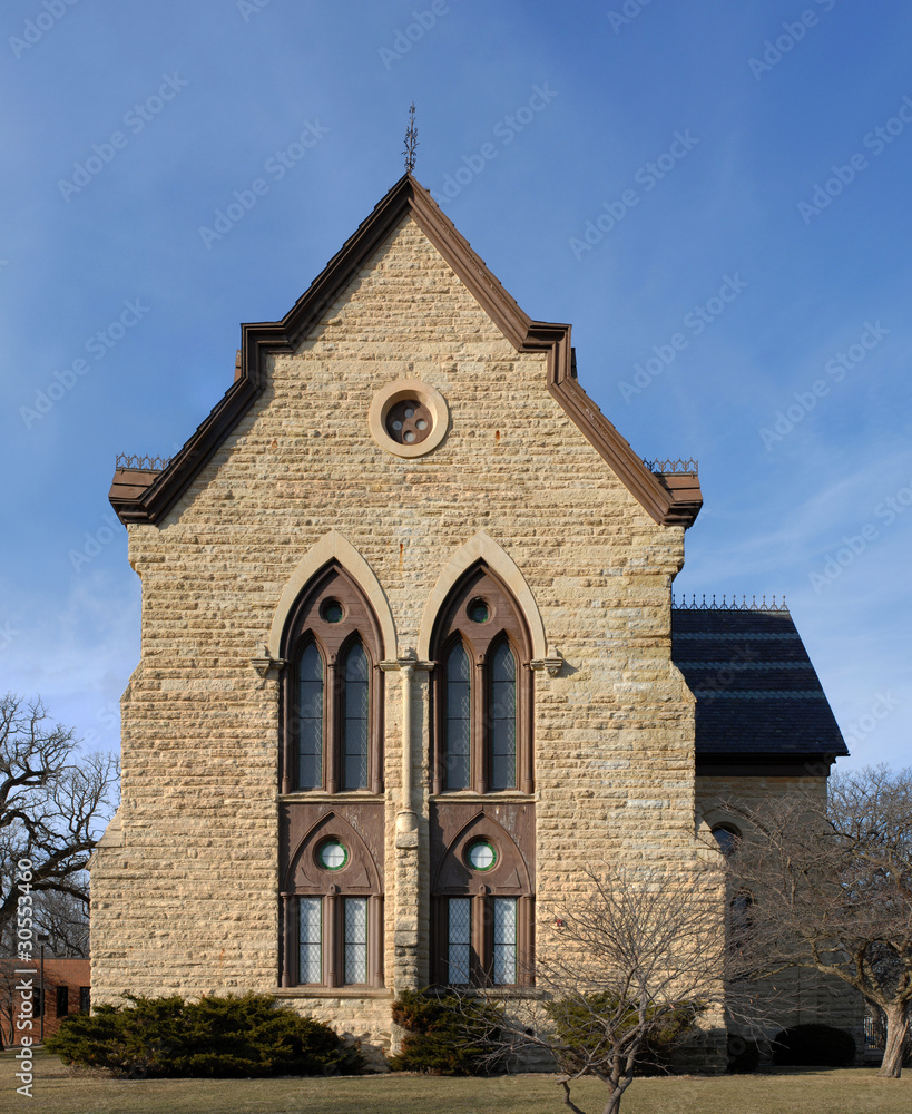 old stone church with gothic windows
