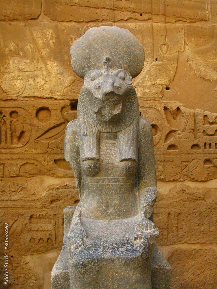 Statue of Sekhmet goddess at temple of Medinet Habu. Luxor Stock Photo ...