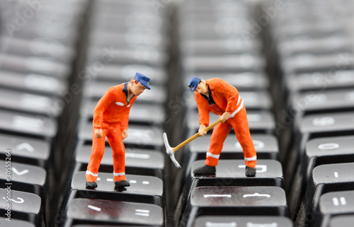 Workers repairing keyboard photo