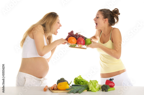 two women squabbling over fruit