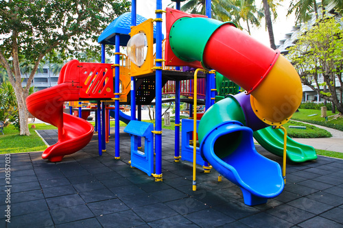 A colorful playground in a park.