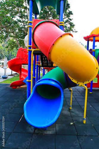 A colorful playground in a park.