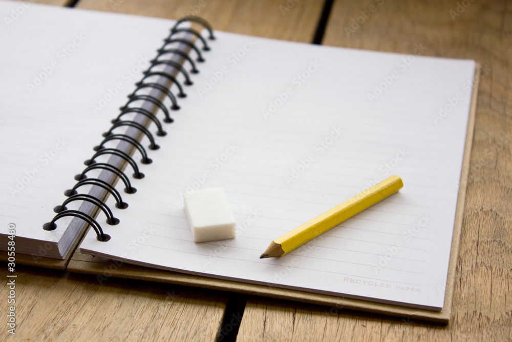 Open blank note book on wood Open blank note book on wood