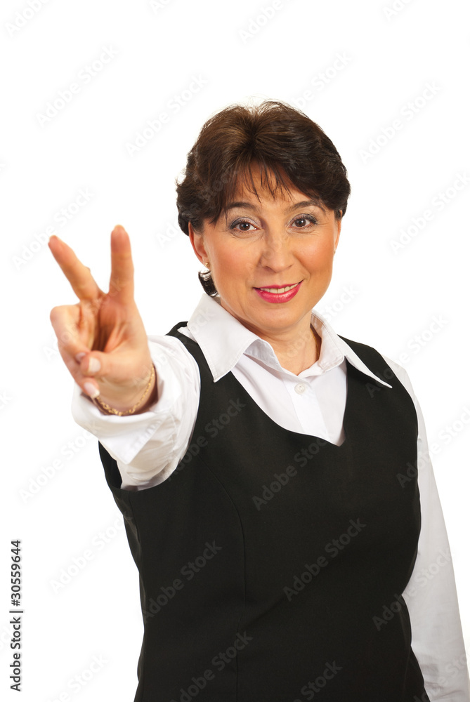 Mature woman show victory sign hand Mature woman show victory sign hand