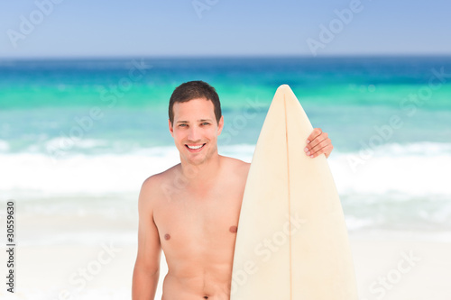 Man with his surfboard