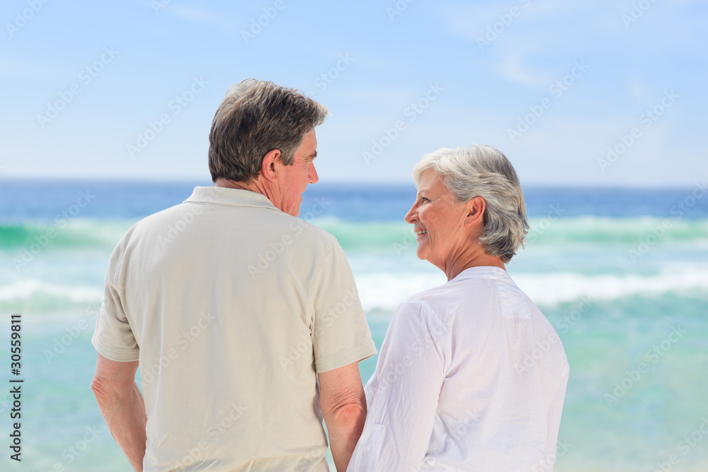 Happy couple on the beach Happy couple on the beach