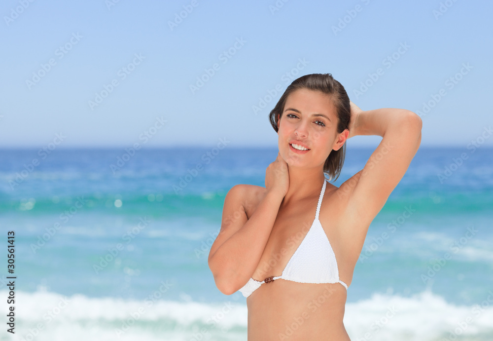 Lovely woman posing in front of the camera Lovely woman posing in front of the camera