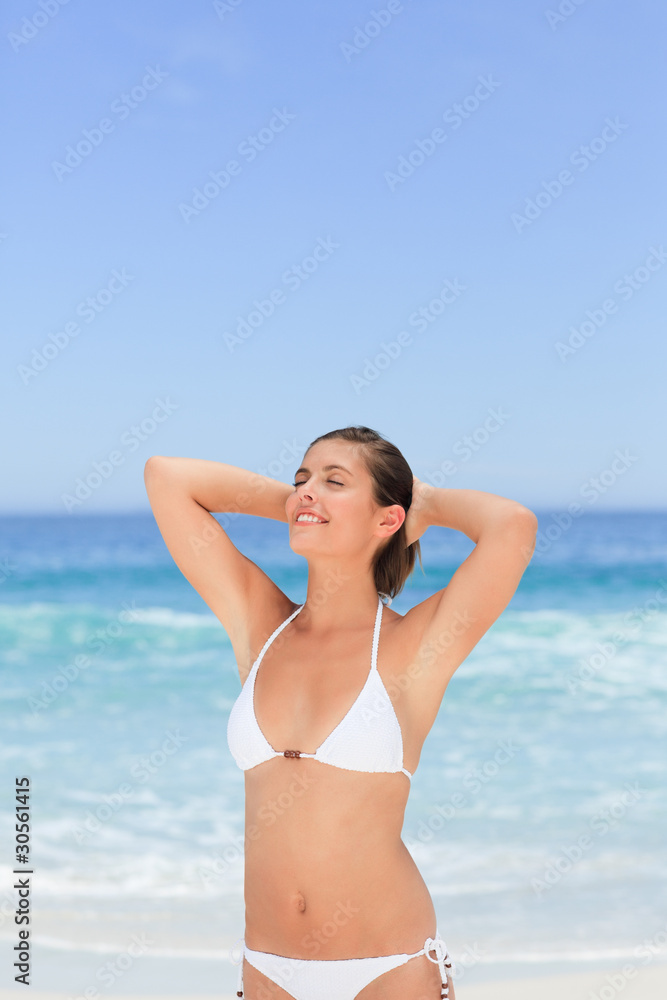 Lovely woman posing in front of the camera Lovely woman posing in front of the camera
