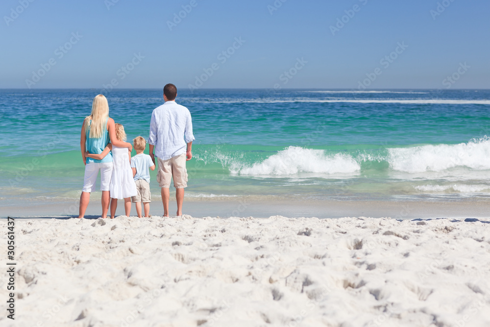 Portrait of a family on the beach Portrait of a family on the beach