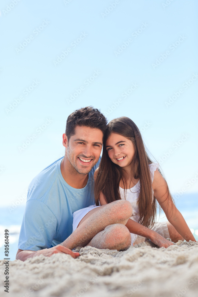 Fototapeta premium Father with his daughter at the beach