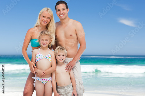 Happy family on the beach © WavebreakMediaMicro
