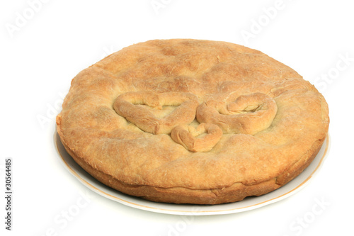 Home-made pie on a plate