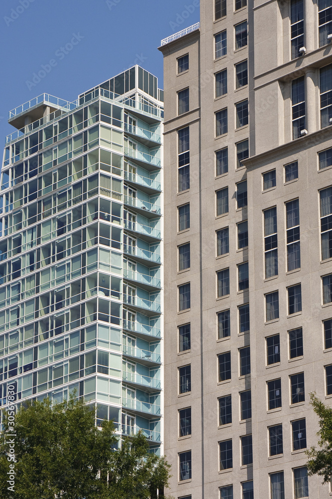 Stone and Blue Glass Facades on Buildings