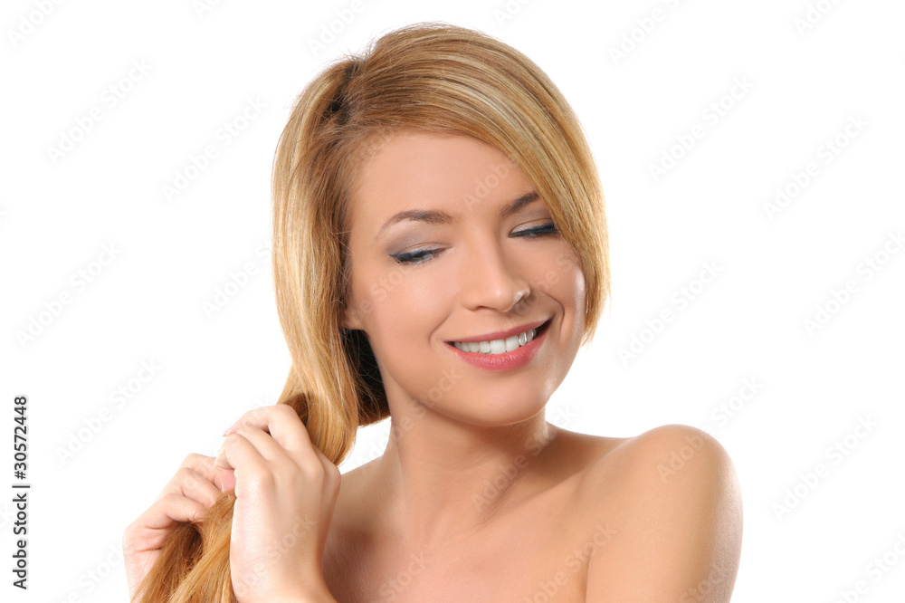 Portrait of a young redhead woman on a white background Portrait of a young redhead woman on a white background