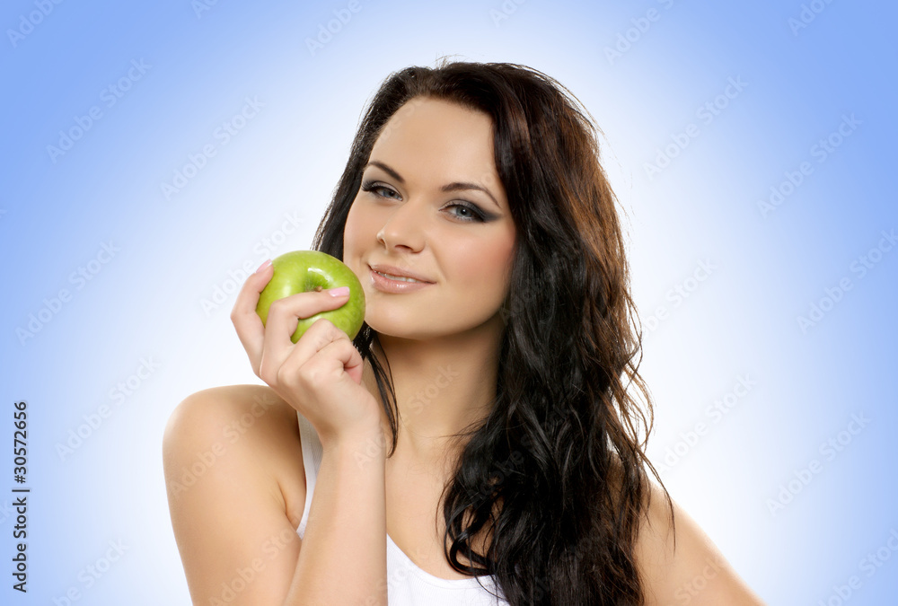 Portrait of a young and attractive woman with fresh fruits Portrait of a young and attractive woman with fresh fruits