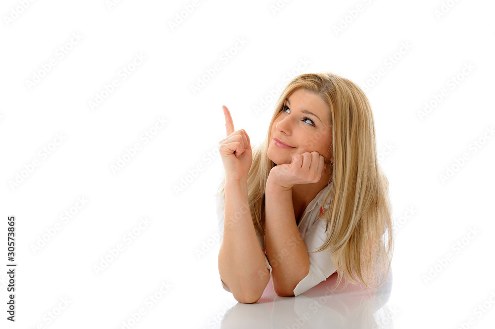 casual smiling woman lying on the floor. place for your product. casual smiling woman lying on the floor. place for your product.