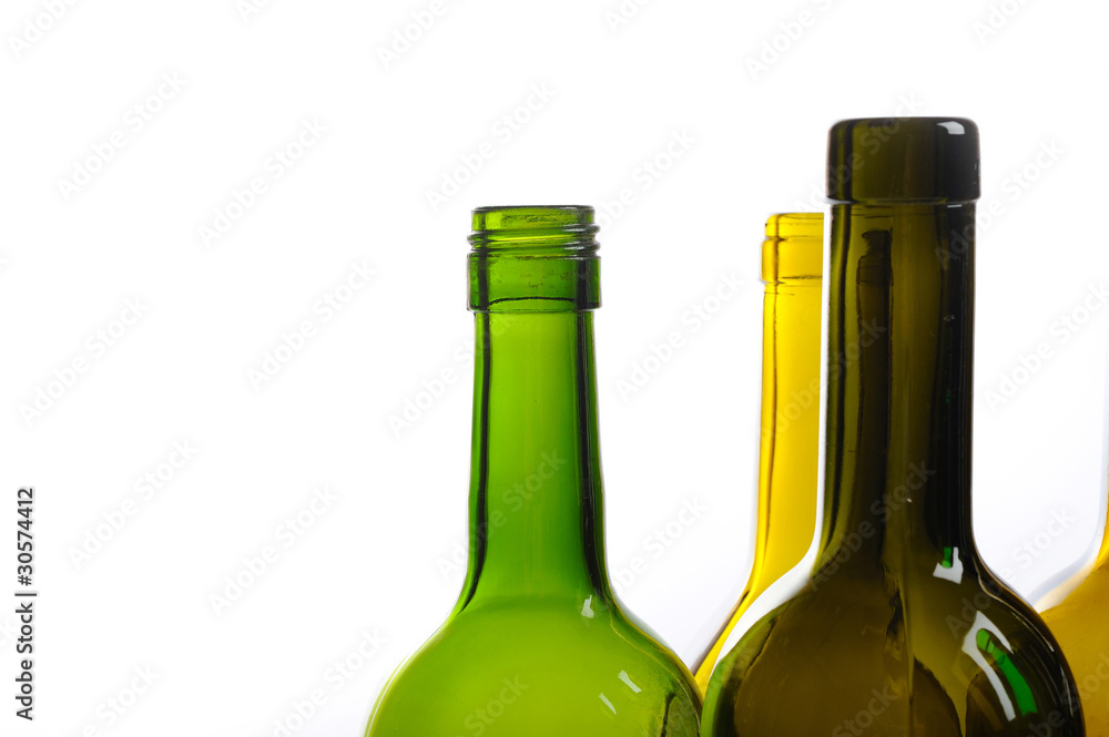 Many empty green wine bottles isolated on white background Many empty green wine bottles isolated on white background