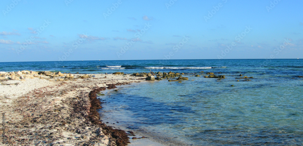 Caribbean beach at the Atlantic ocean in Cancun, Mexico Caribbean beach at the Atlantic ocean in Cancun, Mexico