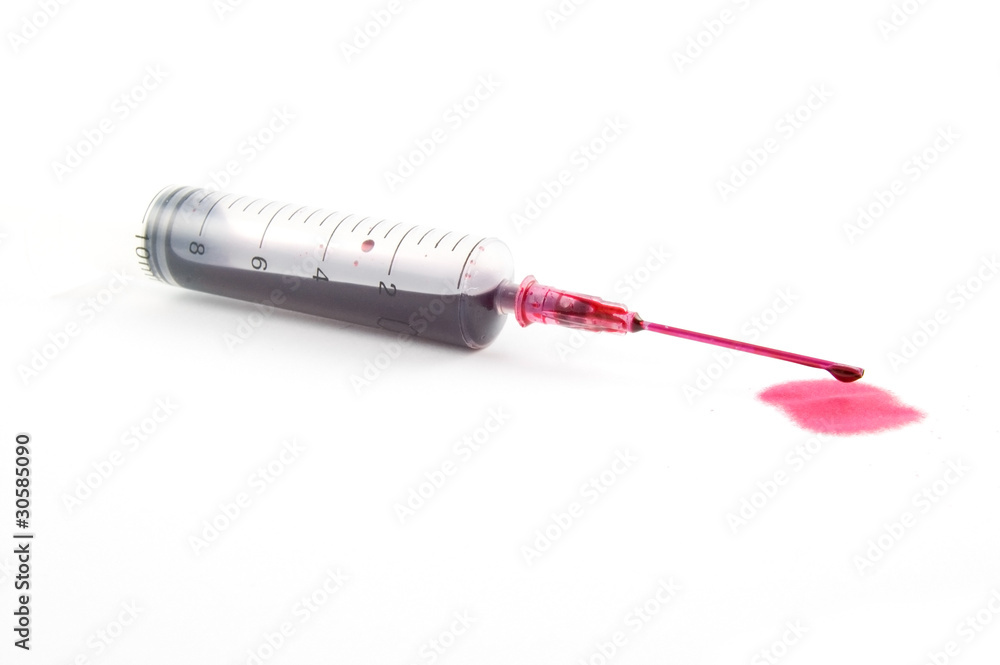 Fototapeta premium blood dripping from syringe