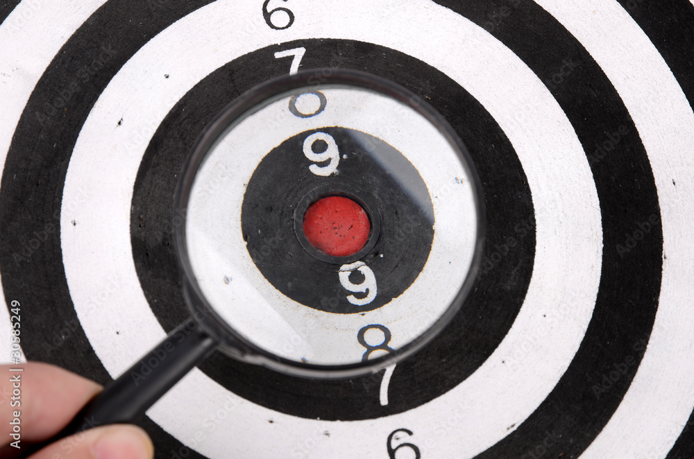 Magnifier and dartboard Magnifier and dartboard