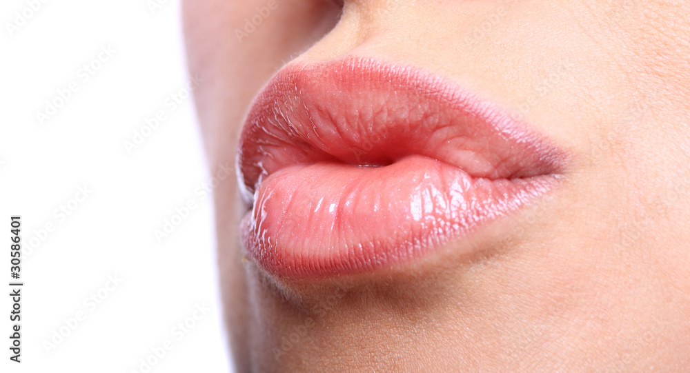 © Netfalls - Young woman's glossy lips © Netfalls - Young woman's glossy lips