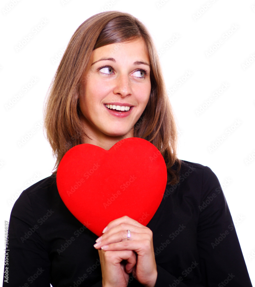 attractive young woman holding a red heart over white background attractive young woman holding a red heart over white background