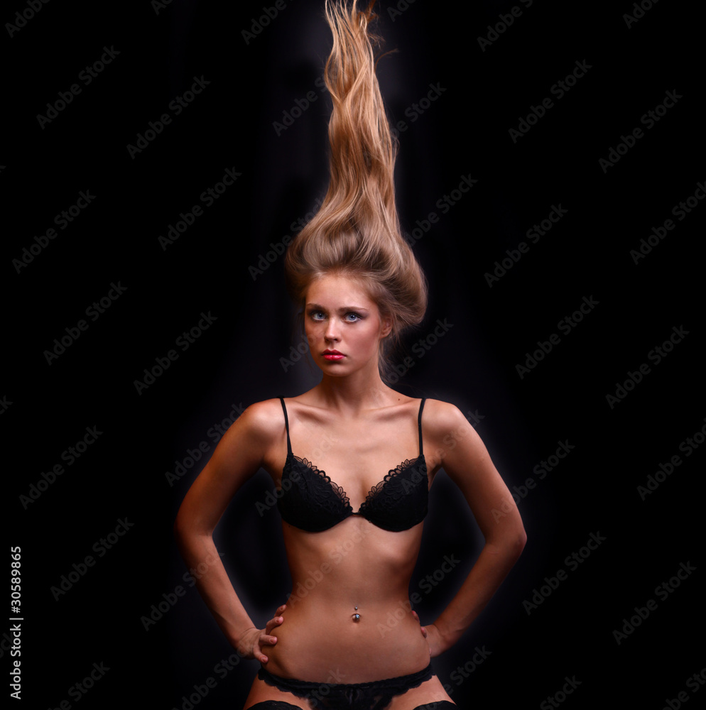 Sexy blonde woman, body on young female in soft light Sexy blonde woman, body on young female in soft light
